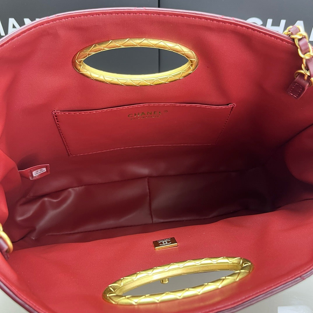 CE-24b’s new black gold evening bag