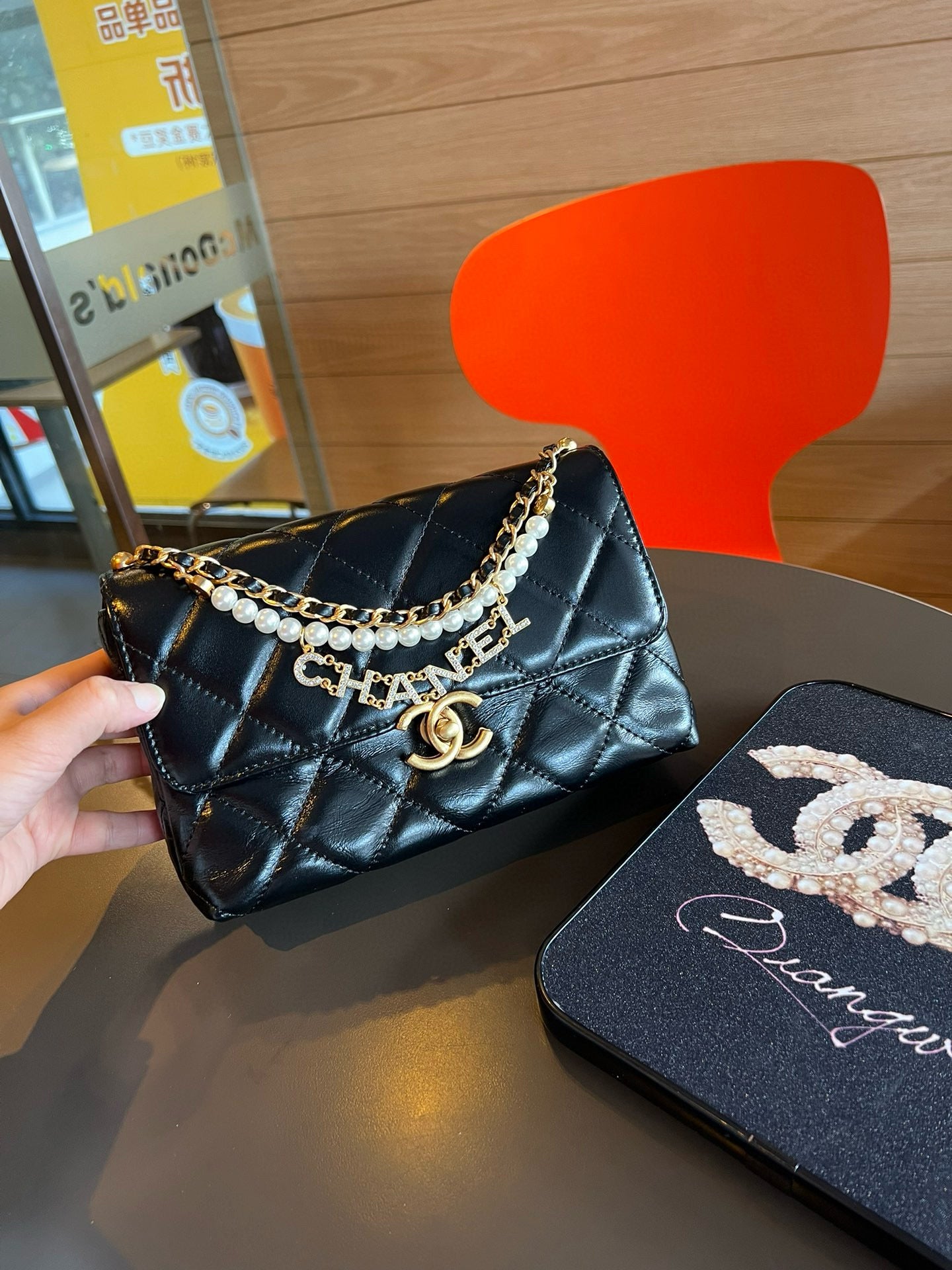 CE-24A pearl necklace flap bag