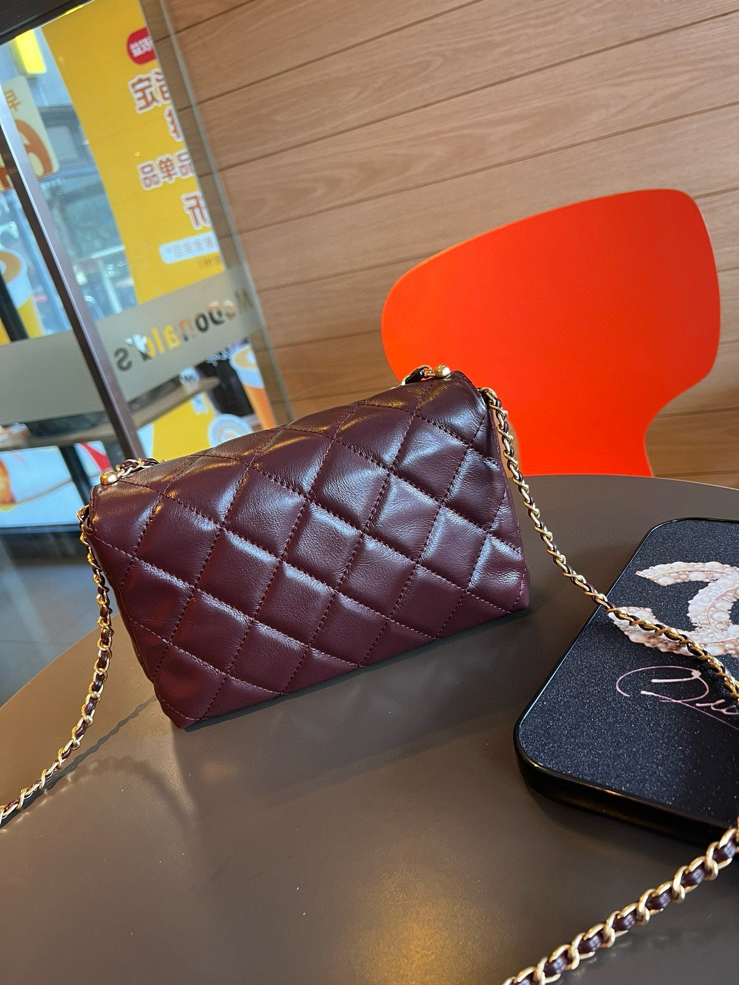 CE-24A pearl necklace flap bag
