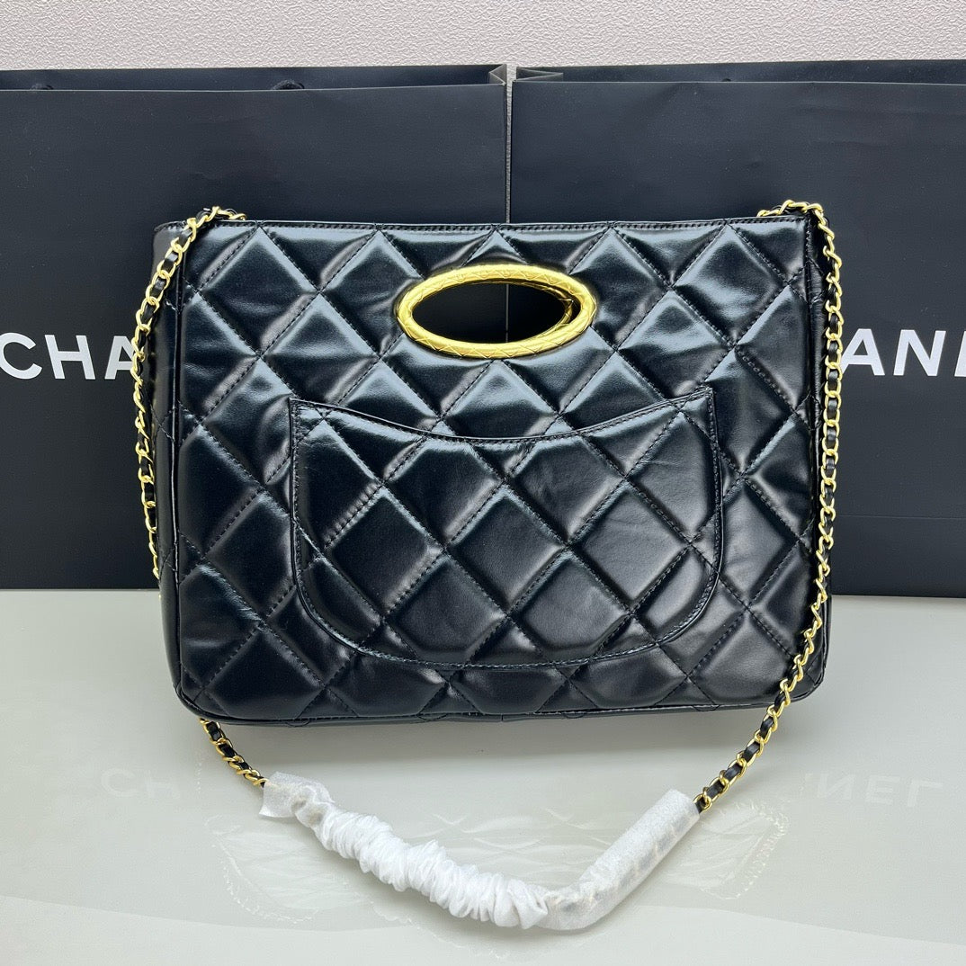 CE-24b’s new black gold evening bag