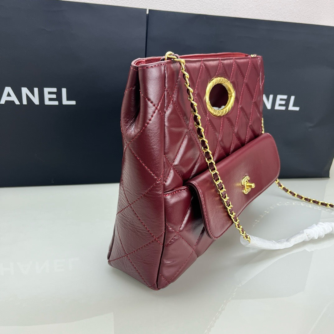CE-24b’s new black gold evening bag