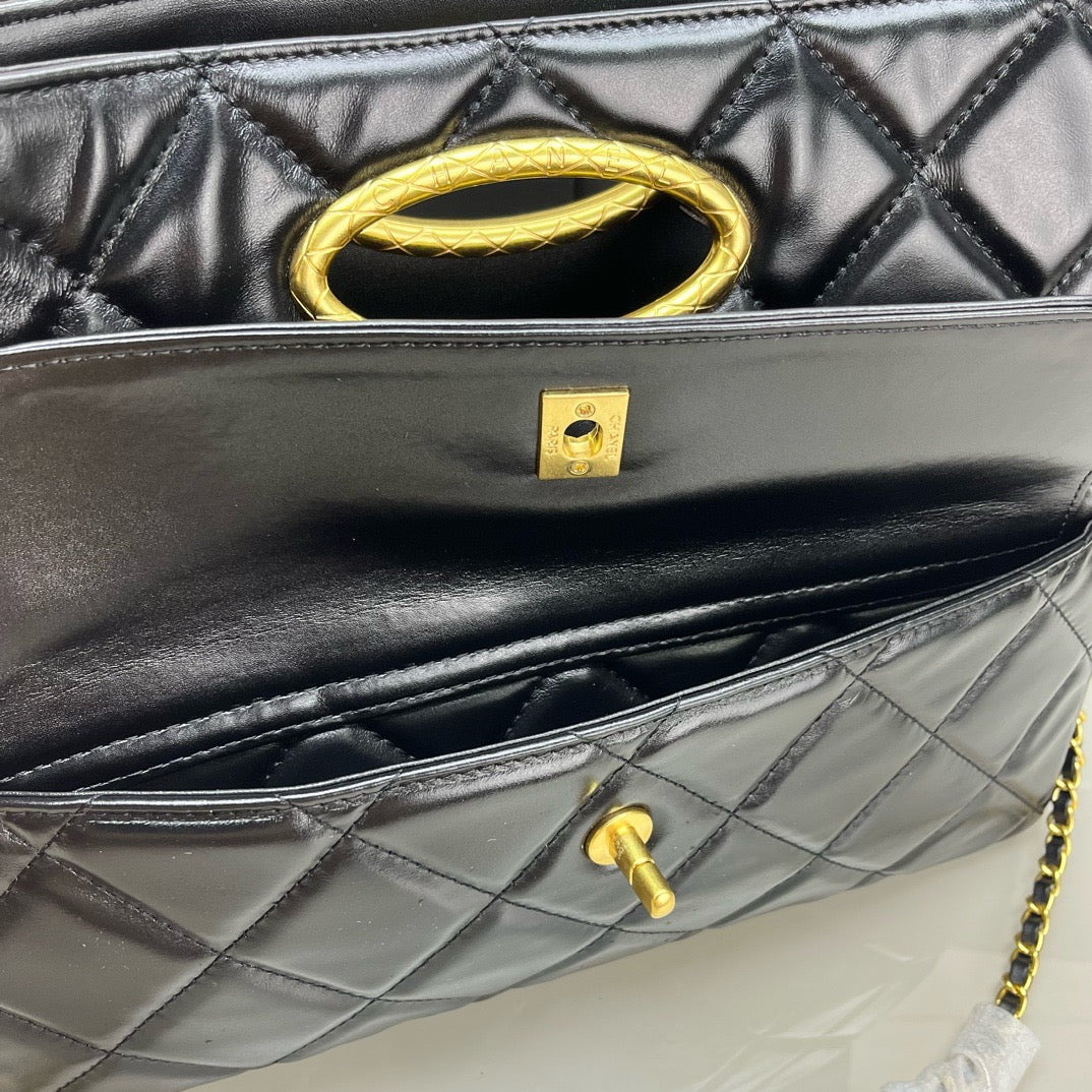 CE-24b’s new black gold evening bag
