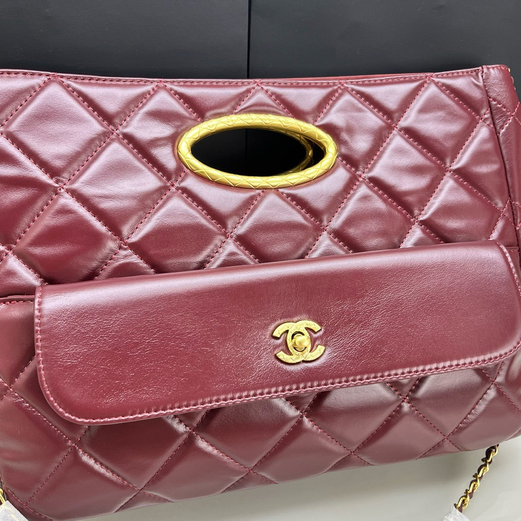 CE-24b’s new black gold evening bag