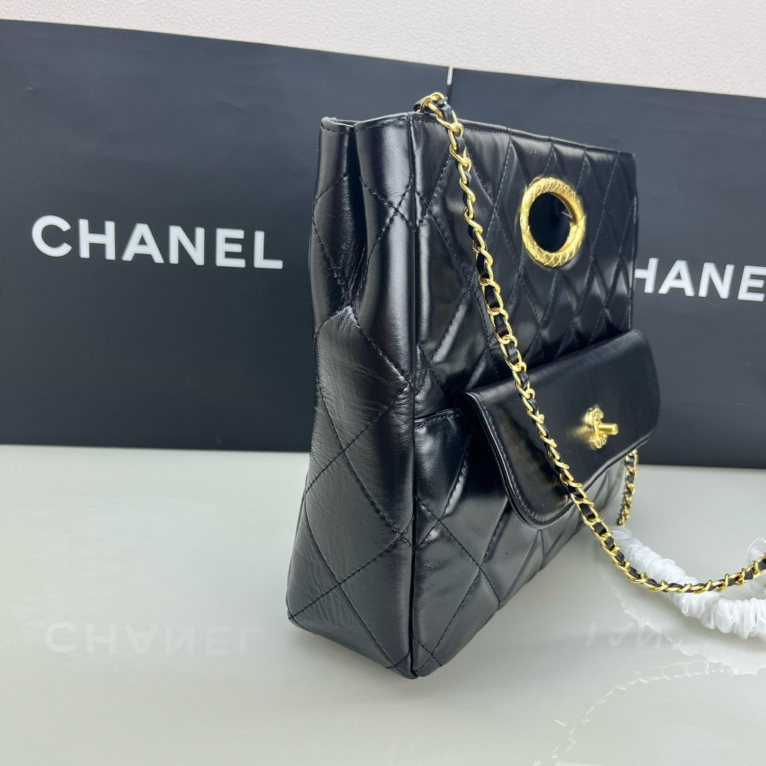 CE-24b’s new black gold evening bag