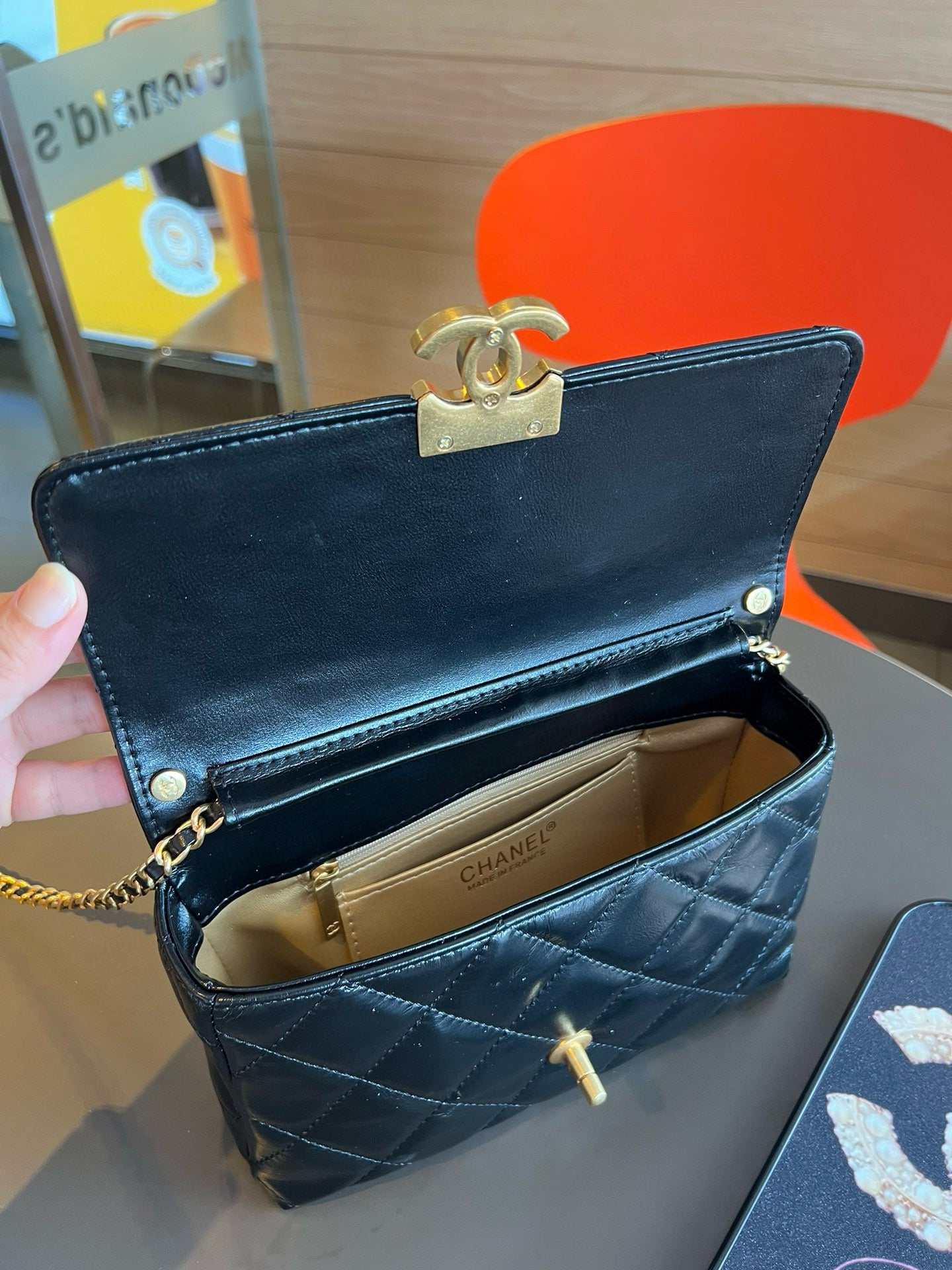 CE-24A pearl necklace flap bag