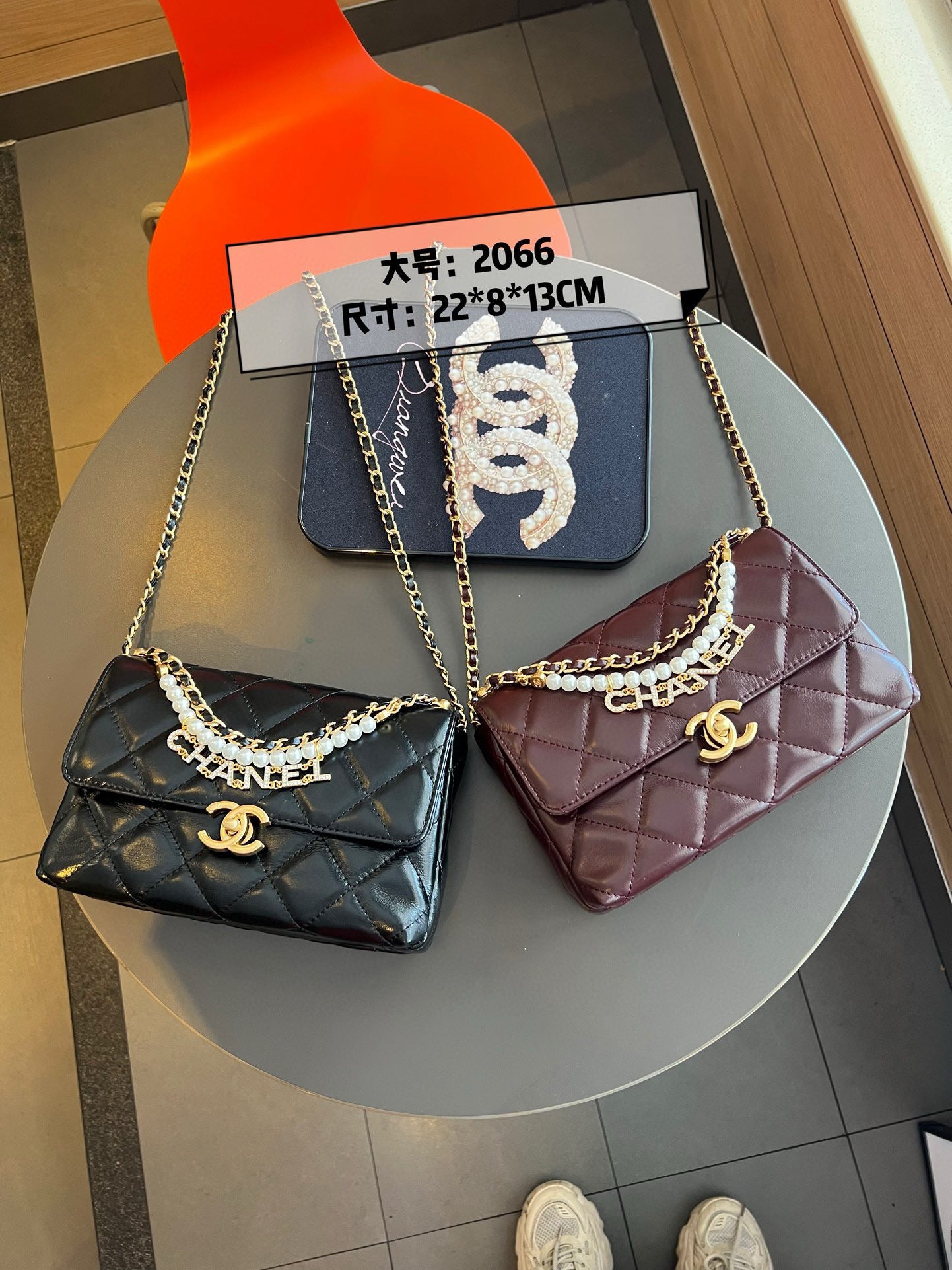 CE-24A pearl necklace flap bag
