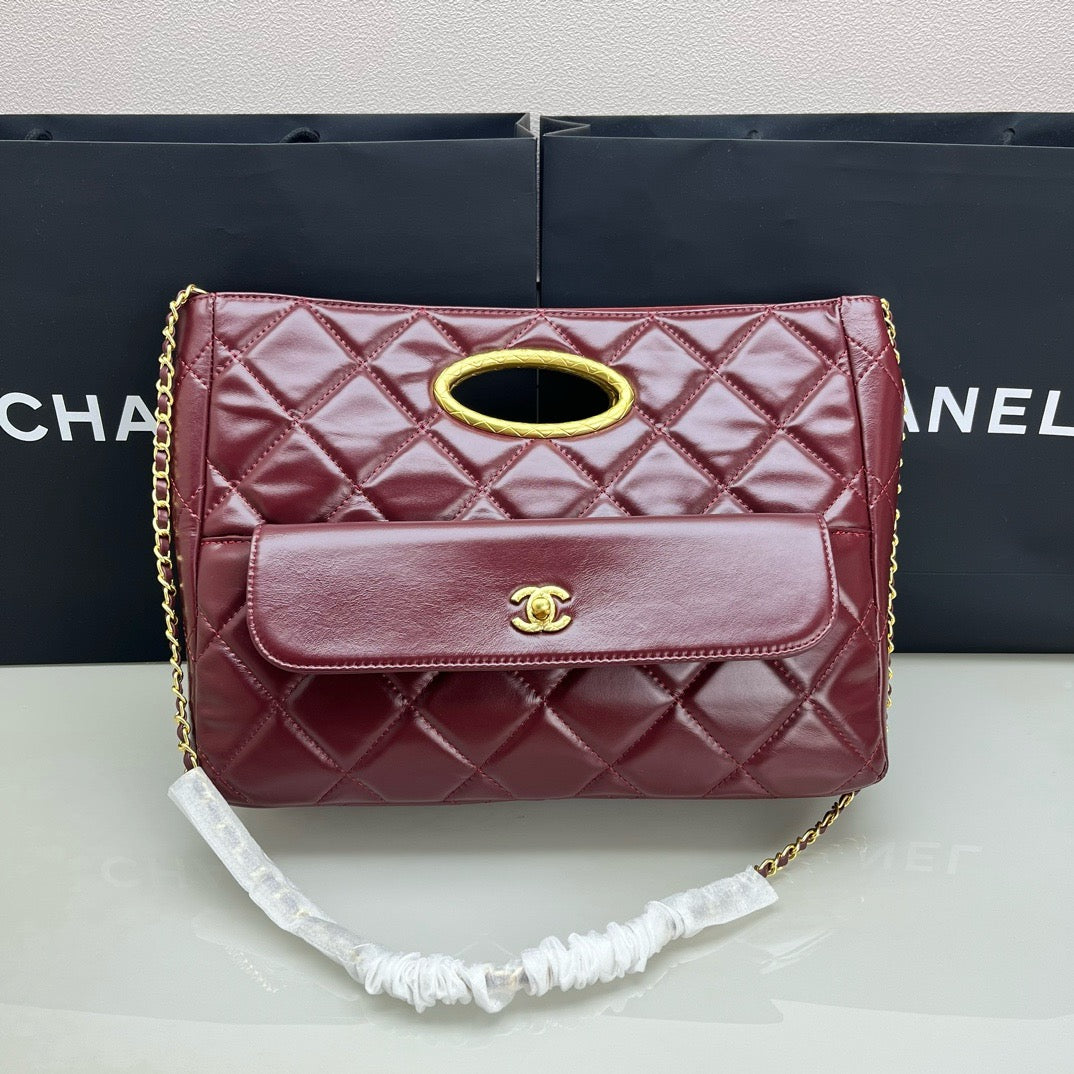 CE-24b’s new black gold evening bag