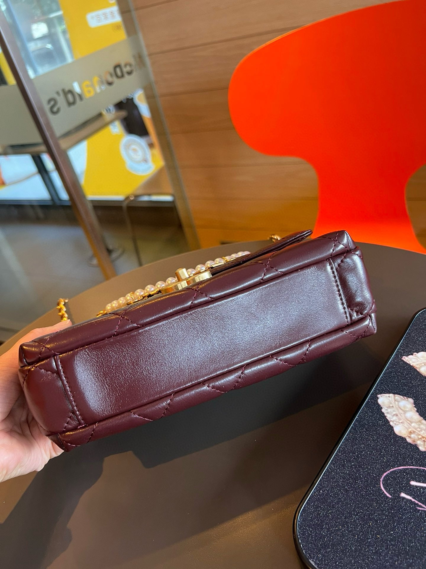 CE-24A pearl necklace flap bag
