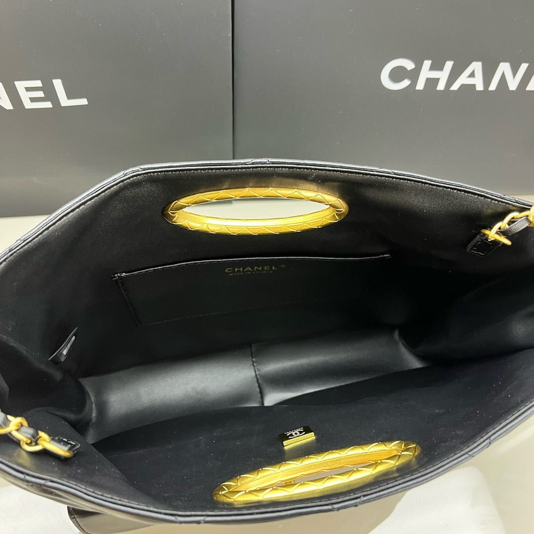 CE-24b’s new black gold evening bag