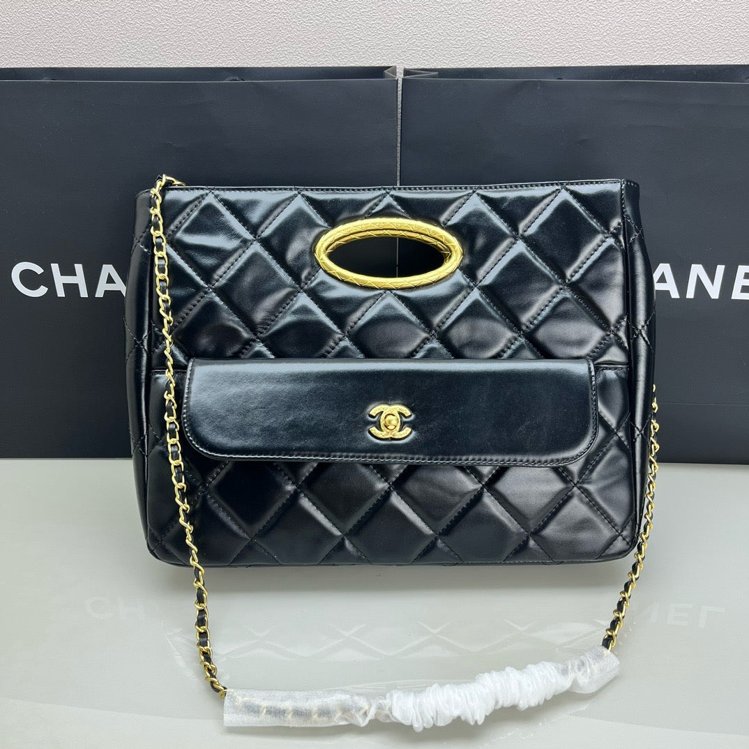 CE-24b’s new black gold evening bag