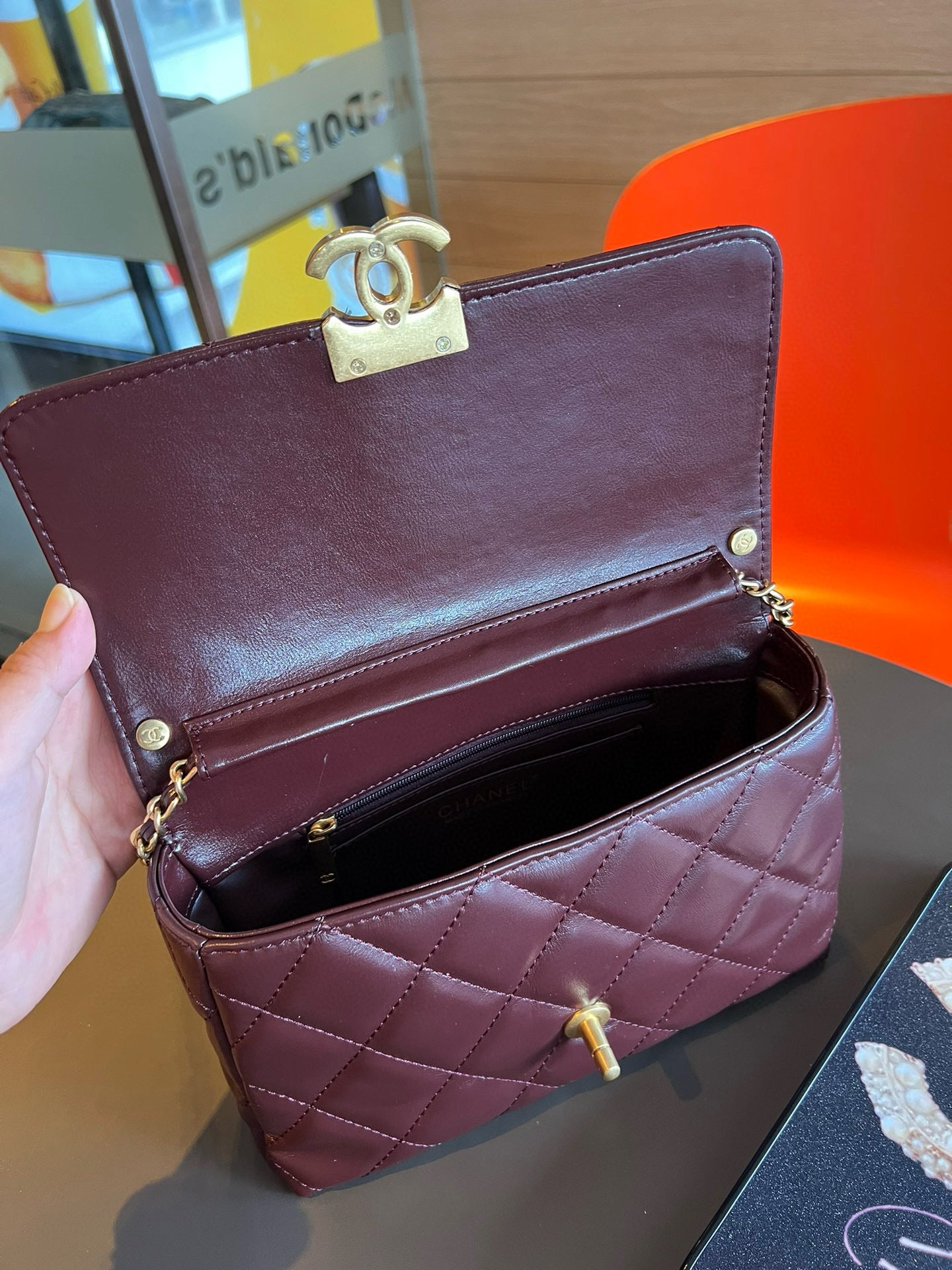 CE-24A pearl necklace flap bag