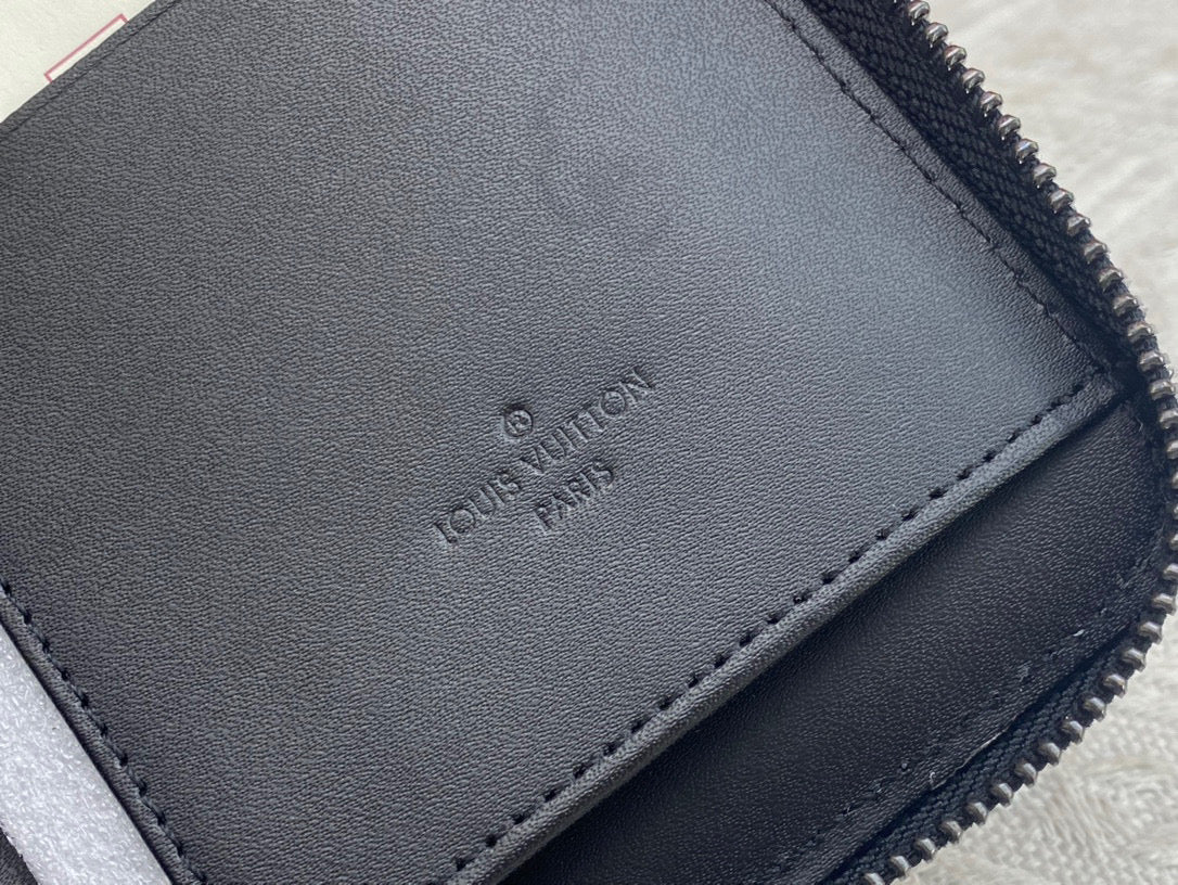 L-Embossed calfskin with smooth leather trim