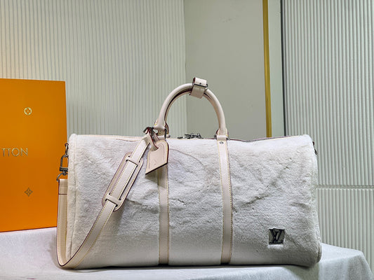 L-Puffy Shearling Keepall Bandoulière 50