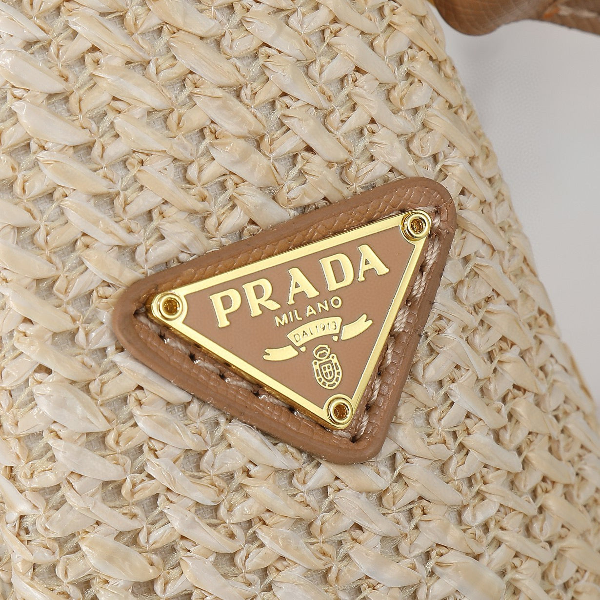 P-Raffia triangle bag